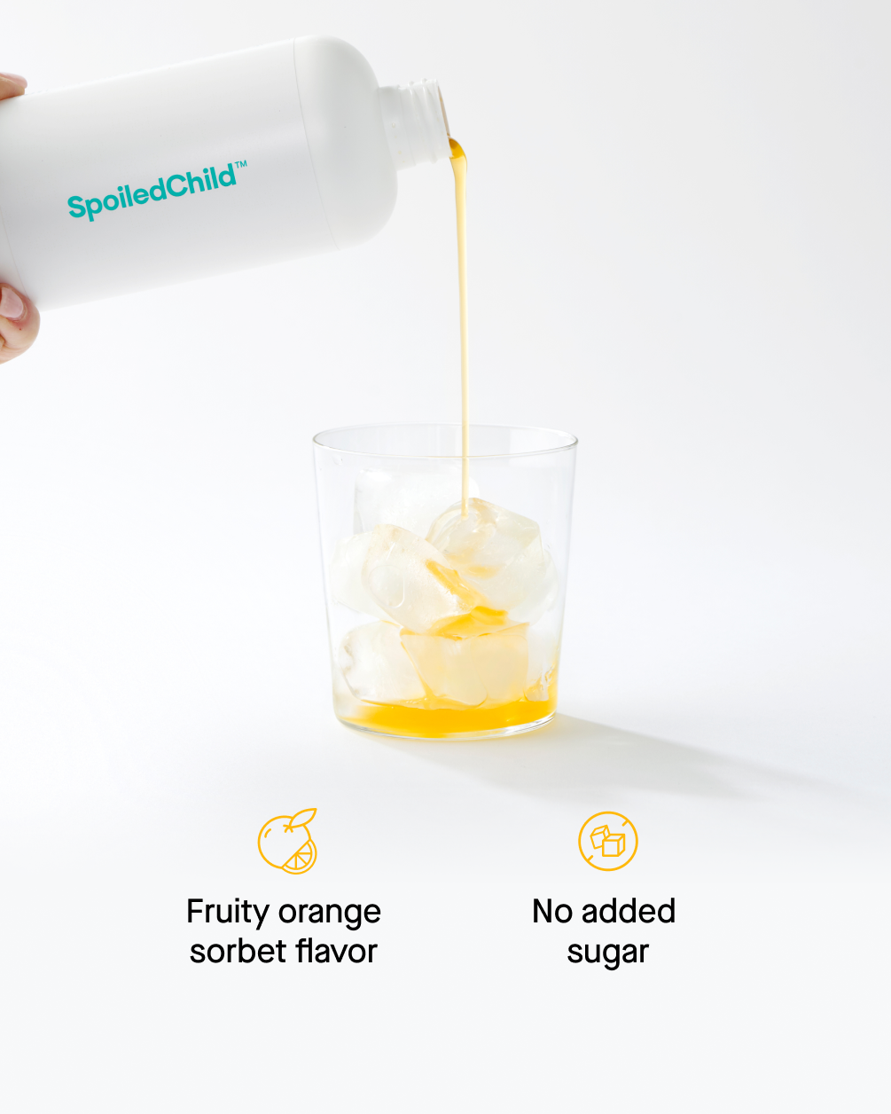 An orange liquid is being poured from a white SpoiledChild bottle into a clear glass filled with ice cubes. Below the image, two icons indicate